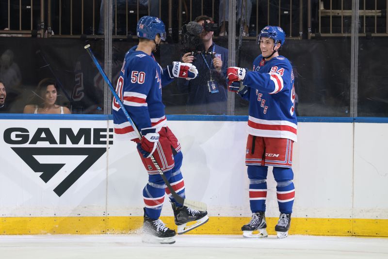 Sep 23, 2025; New York, New York, USA; New York Rangers right wing Gabe Perreault (94) celebrates his second period goal with left wing Will Cuylle (50) during a preseason game against the Boston Bruins at Madison Square Garden. Mandatory Credit: Vincent Carchietta-Imagn Images