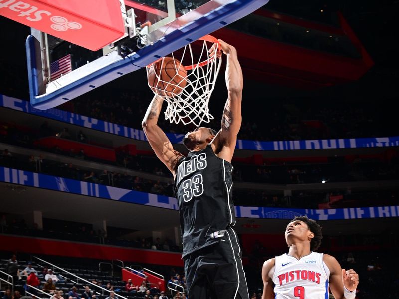 DETROIT, MI - MARCH 7: Nicolas Claxton #33 of the Brooklyn Nets dunks the ball during the game against the Detroit Pistons on March 7, 2024 at Little Caesars Arena in Detroit, Michigan. NOTE TO USER: User expressly acknowledges and agrees that, by downloading and/or using this photograph, User is consenting to the terms and conditions of the Getty Images License Agreement. Mandatory Copyright Notice: Copyright 2024 NBAE (Photo by Chris Schwegler/NBAE via Getty Images)