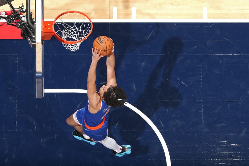 WASHINGTON, DC -? OCTOBER 18: Pacome Dadiet #4 of the New York Knicks dunks the ball during the game against the Washington Wizards on October 18, 2024 at Capital One Arena in Washington, DC. NOTE TO USER: User expressly acknowledges and agrees that, by downloading and or using this Photograph, user is consenting to the terms and conditions of the Getty Images License Agreement. Mandatory Copyright Notice: Copyright 2024 NBAE (Photo by Stephen Gosling/NBAE via Getty Images)