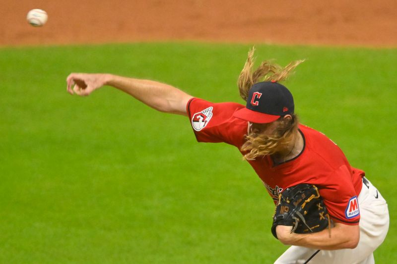 Aug 5, 2024; Cleveland, Ohio, USA; Cleveland Guardians relief pitcher Scott Barlow (58) delivers a pitch in the eighth inning against the Arizona Diamondbacks at Progressive Field. Mandatory Credit: David Richard-USA TODAY Sports