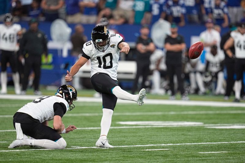 Jacksonville Jaguars place-kicker Brandon McManus (10) makes a 45-yard field goal during the second half of an NFL football game against the Indianapolis Colts Sunday, Sept. 10, 2023, in Indianapolis. (AP Photo/Darron Cummings)