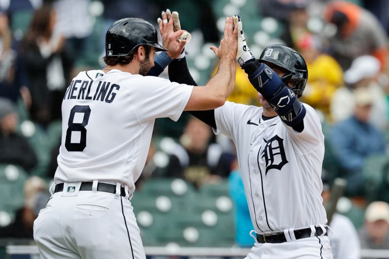 Apr 30, 2023; Detroit, Michigan, USA; Detroit Tigers catcher Jake Rogers (34) receives congratulations from right fielder Matt Vierling (8) after he hit a two run home run in the fifth inning against the Baltimore Orioles at Comerica Park. Mandatory Credit: Rick Osentoski-USA TODAY Sports