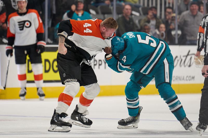 Nov 7, 2023; San Jose, California, USA; Philadelphia Flyers left wing Nicolas Deslauriers (44) fights with San Jose Sharks right wing Givani Smith (54) during the first period at SAP Center at San Jose. Mandatory Credit: Robert Edwards-USA TODAY Sports