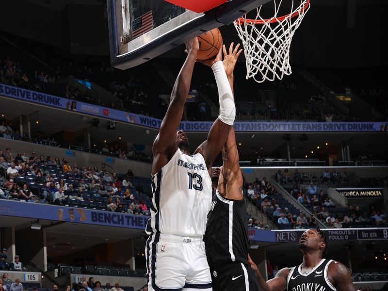 MEMPHIS, TN - February 26:  Jaren Jackson Jr. #13 of the Memphis Grizzlies drives to the basket during the game against the Brooklyn Nets on February 26, 2024 at FedExForum in Memphis, Tennessee. NOTE TO USER: User expressly acknowledges and agrees that, by downloading and or using this photograph, User is consenting to the terms and conditions of the Getty Images License Agreement. Mandatory Copyright Notice: Copyright 2024 NBAE (Photo by Joe Murphy/NBAE via Getty Images)