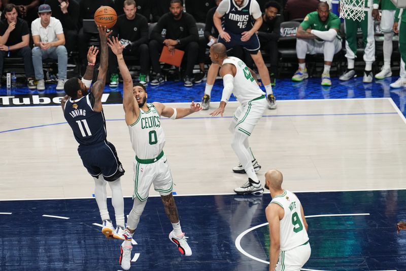 DALLAS, TX - JUNE 14: Kyrie Irving #11 of the Dallas Mavericks shoots the ball during the game against the Boston Celtics during Game Four of the 2024 NBA Finals on June 14, 2024 at the American Airlines Center in Dallas, Texas. NOTE TO USER: User expressly acknowledges and agrees that, by downloading and or using this photograph, User is consenting to the terms and conditions of the Getty Images License Agreement. Mandatory Copyright Notice: Copyright 2024 NBAE (Photo by Glenn James/NBAE via Getty Images)