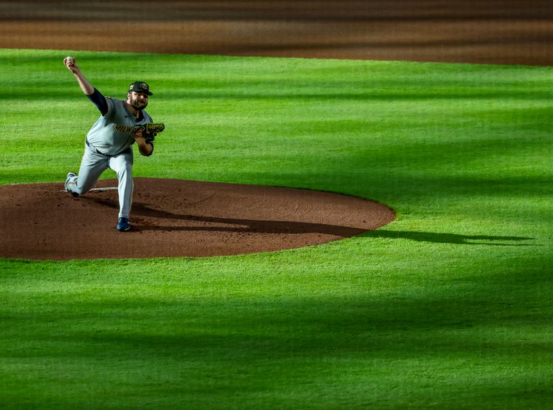 May 18, 2024; Houston, Texas, USA; Milwaukee Brewers starting pitcher Bryse Wilson (46) pitches against the Houston Astros in the second inning at Minute Maid Park. Mandatory Credit: Thomas Shea-USA TODAY Sports