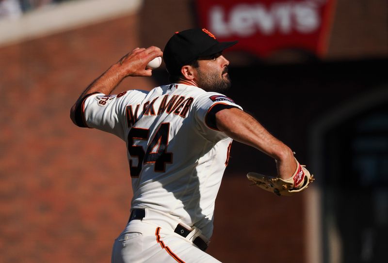 Aug 27, 2023; San Francisco, California, USA; San Francisco Giants relief pitcher Scott Alexander (54) pitches the ball against the Atlanta Braves during the fifth inning at Oracle Park. Mandatory Credit: Kelley L Cox-USA TODAY Sports