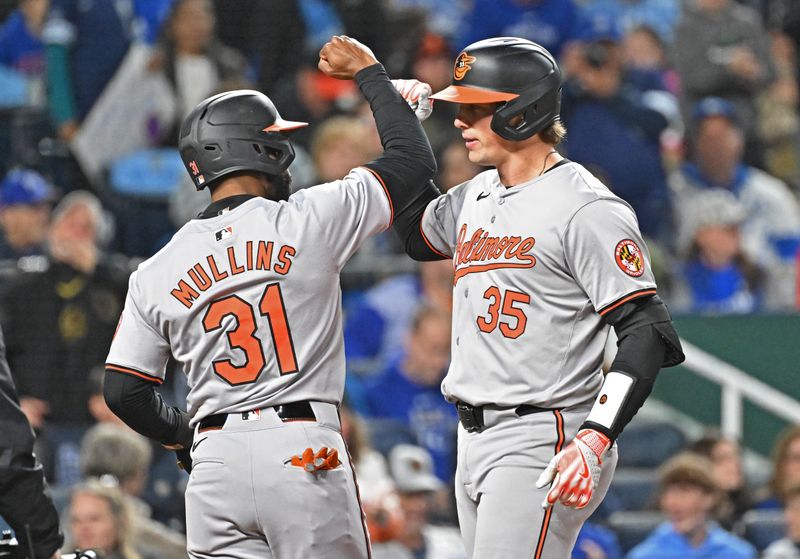 Apr 19, 2024; Kansas City, Missouri, USA; Baltimore Orioles catcher Adley Rutschman (35) celebrates with Baltimore Cedric Mullins (31) after hitting a grand slam in the seventh inning at against the Kansas City Royals Kauffman Stadium. Mandatory Credit: Peter Aiken-USA TODAY Sports