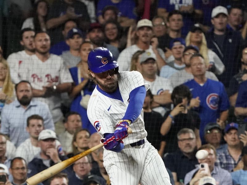 Jun 4, 2024; Chicago, Illinois, USA; Chicago Cubs pinch-hitter Patrick Wisdom (16) hits a two-run home run against the Chicago White Sox during the sixth inning at Wrigley Field. Mandatory Credit: David Banks-USA TODAY Sports