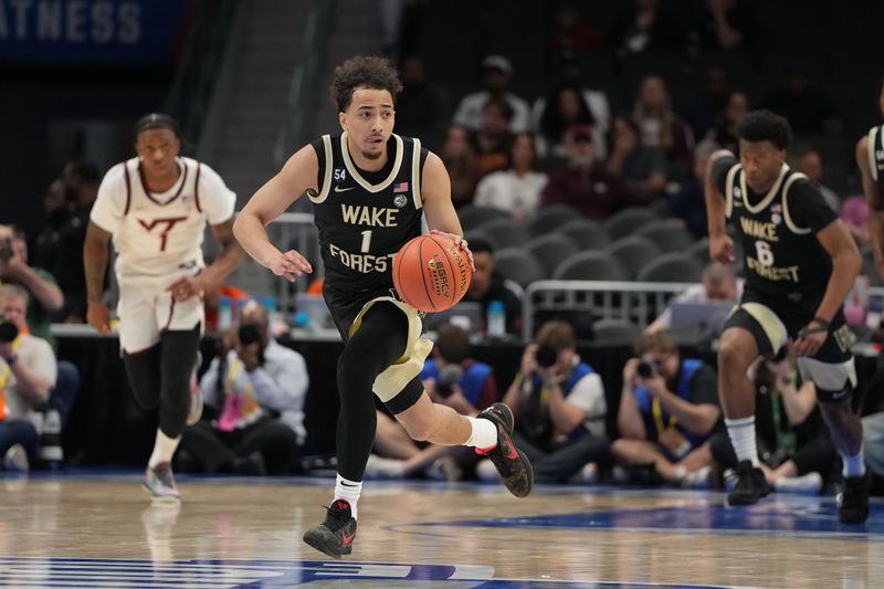 Mar 10, 2026; Charlotte, NC, USA; Wake Forest Demon Deacons guard Nate Calmese (1) on the fast break in the first half at Spectrum Center. Mandatory Credit: Bob Donnan-Imagn Images