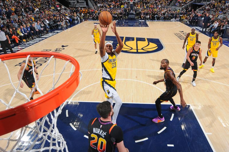 INDIANAPOLIS, IN - JANUARY 26: Myles Turner #33 of the Indiana Pacers shoots the ball during the game against the Phoenix Suns on January 26, 2024 at Gainbridge Fieldhouse in Indianapolis, Indiana. NOTE TO USER: User expressly acknowledges and agrees that, by downloading and or using this Photograph, user is consenting to the terms and conditions of the Getty Images License Agreement. Mandatory Copyright Notice: Copyright 2024 NBAE (Photo by Ron Hoskins/NBAE via Getty Images)