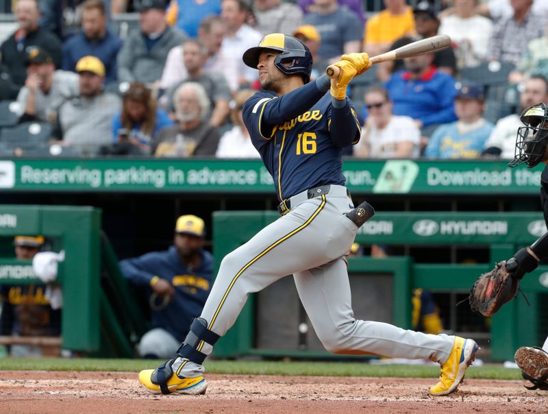 Sep 26, 2024; Pittsburgh, Pennsylvania, USA;  Milwaukee Brewers center fielder Blake Perkins (16) hits an RBI double against the Pittsburgh Pirates during the sixth inning at PNC Park. Mandatory Credit: Charles LeClaire-Imagn Images