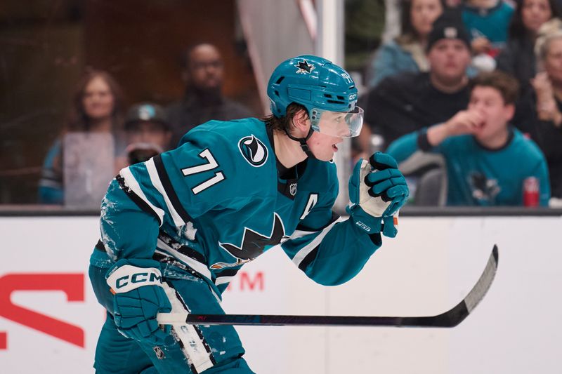 Jan 10, 2026; San Jose, California, USA; San Jose Sharks center Macklin Celebrini (71) skates to the bench for a line change against the Dallas Stars during the second period at SAP Center at San Jose. Mandatory Credit: Robert Edwards-Imagn Images