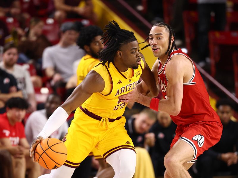Feb 28, 2026; Tempe, Arizona, USA; Arizona State Sun Devils forward Allen Mukeba (left) against Utah Utes forward Keanu Dawes in the first half at Desert Financial Arena. Mandatory Credit: Mark J. Rebilas-Imagn Images