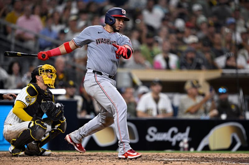 Jun 24, 2024; San Diego, California, USA; Washington Nationals catcher Keibert Ruiz (20) hits a RBI double against the San Diego Padres during the tenth inning at Petco Park. Mandatory Credit: Orlando Ramirez-USA TODAY Sports