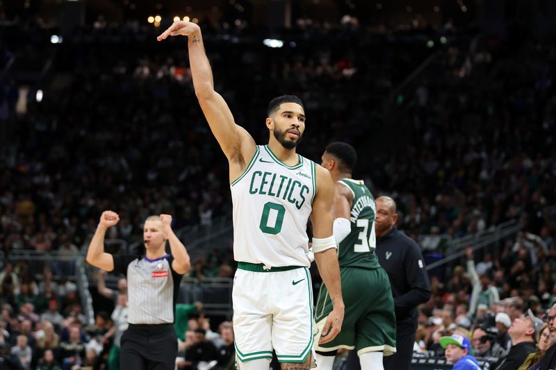 MILWAUKEE, WISCONSIN - NOVEMBER 10: Jayson Tatum #0 of the Boston Celtics reacts to a three point shot during the second half of a game against the Milwaukee Bucks at Fiserv Forum on November 10, 2024 in Milwaukee, Wisconsin. NOTE TO USER: User expressly acknowledges and agrees that, by downloading and or using this photograph, User is consenting to the terms and conditions of the Getty Images License Agreement. (Photo by Stacy Revere/Getty Images)