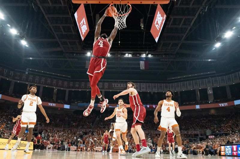 Feb 18, 2023; Austin, Texas, USA; Oklahoma Sooners guard Joe Bamisile (4) dunks during the first half against the Texas Longhorns at Moody Center. Mandatory Credit: Scott Wachter-USA TODAY Sports