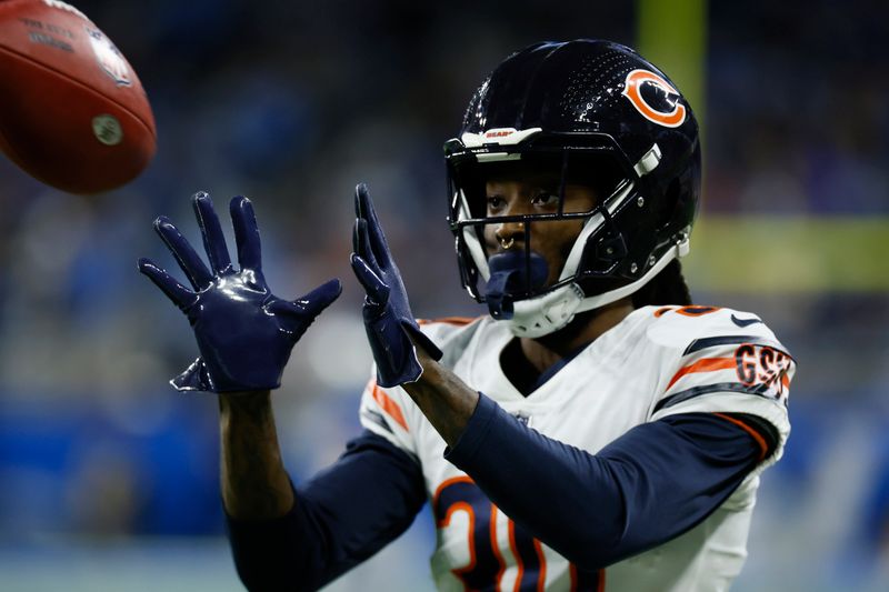 Chicago Bears cornerback Harrison Hand catches during pregame of an NFL football game against the Detroit Lions, Sunday, Jan. 1, 2023, in Detroit. (AP Photo/Duane Burleson)