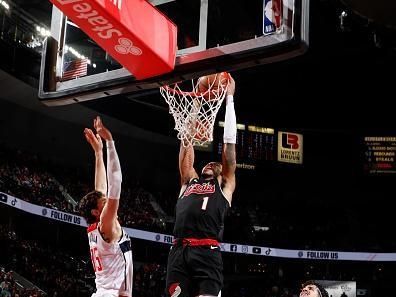 PORTLAND, OR - DECEMBER 21: Anfernee Simons #1 of the Portland Trail Blazers dunks the ball during the game against the Washington Wizards on December 21, 2023 at the Moda Center Arena in Portland, Oregon. NOTE TO USER: User expressly acknowledges and agrees that, by downloading and or using this photograph, user is consenting to the terms and conditions of the Getty Images License Agreement. Mandatory Copyright Notice: Copyright 2023 NBAE (Photo by Cameron Browne/NBAE via Getty Images)