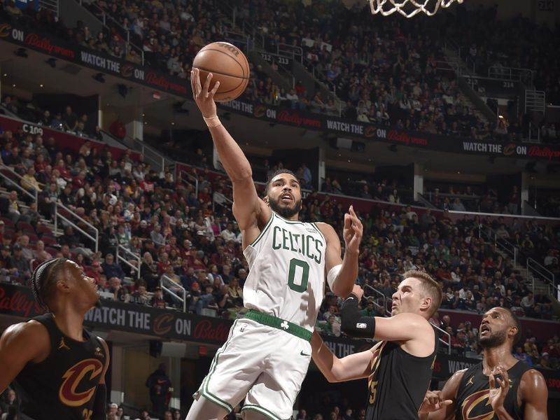 CLEVELAND, OH - MARCH 5: Jayson Tatum #0 of the Boston Celtics drives to the basket during the game against the Cleveland Cavaliers on March 5, 2024 at Rocket Mortgage FieldHouse in Cleveland, Ohio. NOTE TO USER: User expressly acknowledges and agrees that, by downloading and/or using this Photograph, user is consenting to the terms and conditions of the Getty Images License Agreement. Mandatory Copyright Notice: Copyright 2024 NBAE (Photo by David Liam Kyle/NBAE via Getty Images)