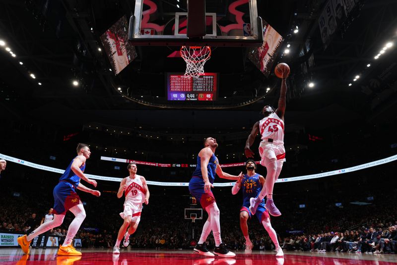 TORONTO, CANADA - OCTOBER 28: Chris Boucher #25 of the Toronto Raptors drives to the basket during the game Denver Nuggets on October 28, 2024 at the Scotiabank Arena in Toronto, Ontario, Canada.  NOTE TO USER: User expressly acknowledges and agrees that, by downloading and or using this Photograph, user is consenting to the terms and conditions of the Getty Images License Agreement.  Mandatory Copyright Notice: Copyright 2024 NBAE (Photo by Mark Blinch/NBAE via Getty Images)