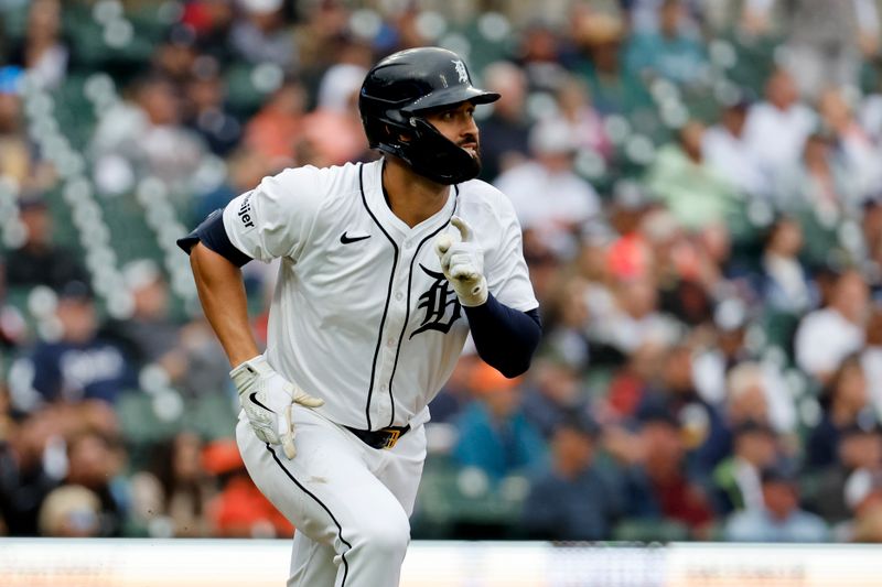 Sep 24, 2024; Detroit, Michigan, USA;  Detroit Tigers left fielder Riley Greene (31) hits a single in the fourth inning against the Tampa Bay Rays at Comerica Park. Mandatory Credit: Rick Osentoski-Imagn Images