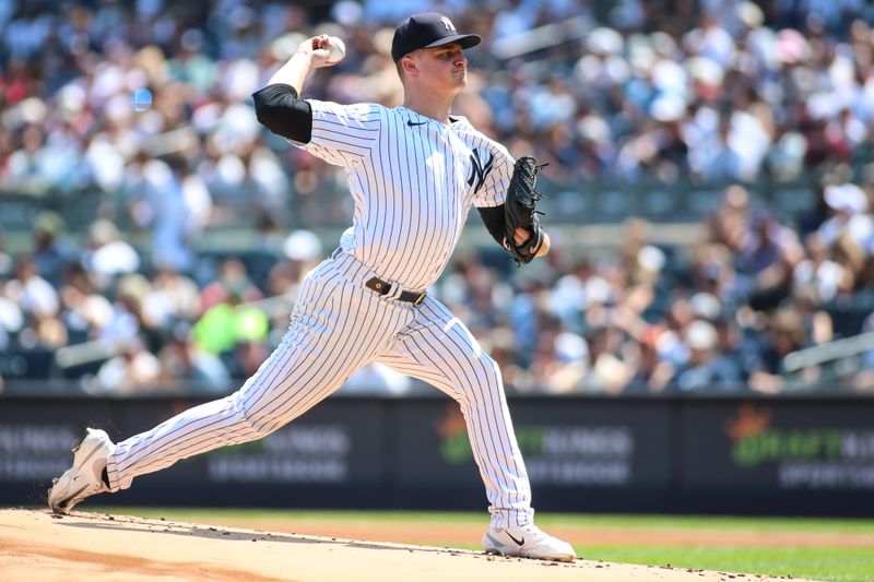 Aug 20, 2023; Bronx, New York, USA;  New York Yankees starting pitcher Clarke Schmidt (36) pitches in the first inning against the Boston Red Sox at Yankee Stadium. Mandatory Credit: Wendell Cruz-USA TODAY Sports