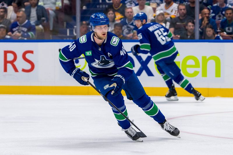 May 10, 2024; Vancouver, British Columbia, CAN; Vancouver Canucks forward Elias Pettersson (40) skates against the Edmonton Oilers during the third period in game two of the second round of the 2024 Stanley Cup Playoffs at Rogers Arena. Mandatory Credit: Bob Frid-USA TODAY Sports