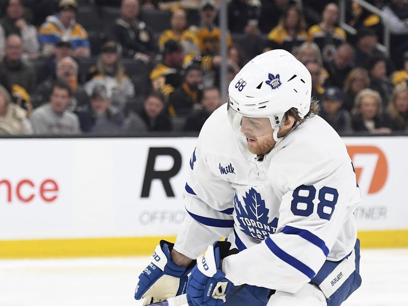 Apr 30, 2024; Boston, Massachusetts, USA; Toronto Maple Leafs right wing William Nylander (88) tries to gain control of the puck during the second period in game five of the first round of the 2024 Stanley Cup Playoffs against the Boston Bruins at TD Garden. Mandatory Credit: Bob DeChiara-USA TODAY Sports