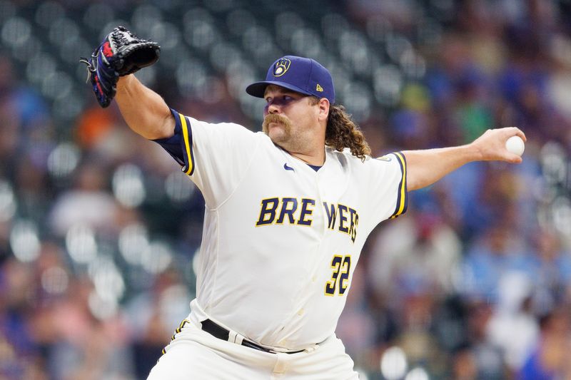 Aug 8, 2023; Milwaukee, Wisconsin, USA;  Milwaukee Brewers pitcher Andrew Chafin (32) throws a pitch during the tenth inning against the Colorado Rockies at American Family Field. Mandatory Credit: Jeff Hanisch-USA TODAY Sports