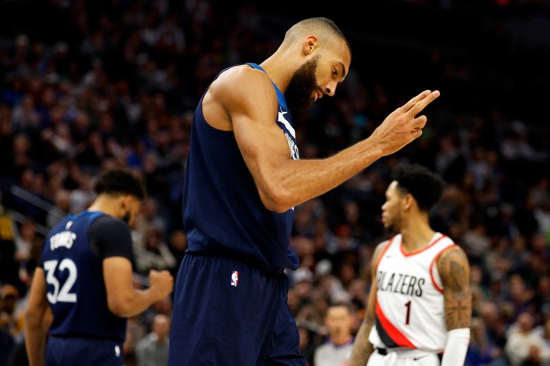 MINNEAPOLIS, MINNESOTA - MARCH 04: Rudy Gobert #27 of the Minnesota Timberwolves celebrates drawing a foul against the Portland Trail Blazers in the third quarter at Target Center on March 04, 2024 in Minneapolis, Minnesota. The Timberwolves defeated the Trail Blazers 119-114. NOTE TO USER: User expressly acknowledges and agrees that, by downloading and or using this photograph, User is consenting to the terms and conditions of the Getty Images License Agreement. (Photo by David Berding/Getty Images)