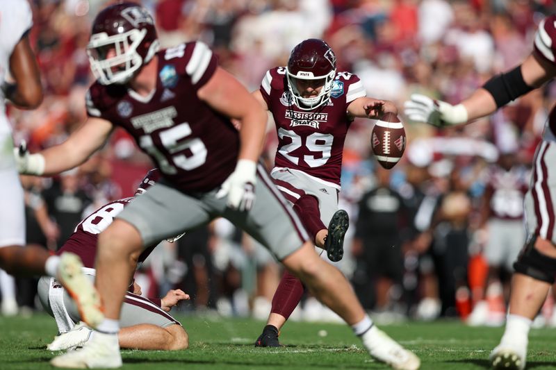 Jan 2, 2023; Tampa, FL, USA; Mississippi State Bulldogs place kicker Massimo Biscardi (29) kicks a field goal against the Illinois Fighting Illini in the fourth quarter during the 2023 ReliaQuest Bowl at Raymond James Stadium. Mandatory Credit: Nathan Ray Seebeck-USA TODAY Sports