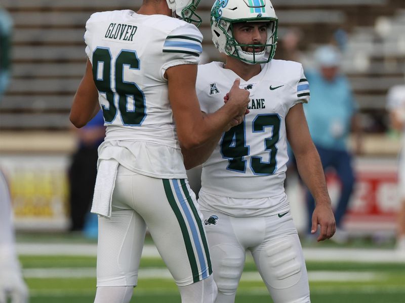 Oct 28, 2023; Houston, Texas, USA; Tulane Green Wave place kicker Valentino Ambrosio (43) celebrates with place holder Casey Glover (96) after kicking a field goal against the Rice Owls in the second half at Rice Stadium. Mandatory Credit: Thomas Shea-USA TODAY Sports