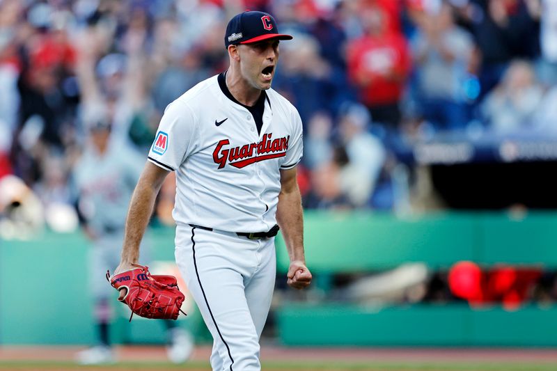 Oct 7, 2024; Cleveland, Ohio, USA; Cleveland Guardians pitcher Matthew Boyd (16) reacts after getting the last out of the fourth inning against the Detroit Tigers during game two of the ALDS for the 2024 MLB Playoffs at Progressive Field. Mandatory Credit: Scott Galvin-Imagn Images