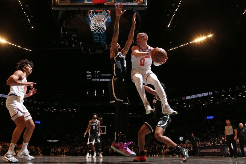 BROOKLYN, NY - JANUARY 23: Donte Divincenzo #0 of the New York Knicks looks to pass the ball during the game against the Brooklyn Nets on January 23, 2024 at Barclays Center in Brooklyn, New York. NOTE TO USER: User expressly acknowledges and agrees that, by downloading and or using this Photograph, user is consenting to the terms and conditions of the Getty Images License Agreement. Mandatory Copyright Notice: Copyright 2024 NBAE (Photo by Nathaniel S. Butler/NBAE via Getty Images)