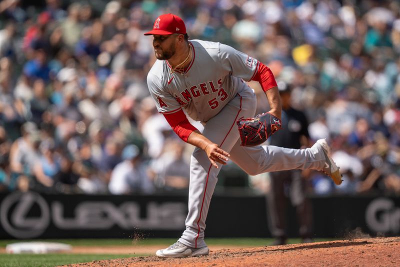 Jul 24, 2024; Seattle, Washington, USA;  Los Angeles Angels reliever Carlos Estevez (53) delivers a pitch during the ninth inning against the Seattle Mariners at T-Mobile Park. Mandatory Credit: Stephen Brashear-USA TODAY Sports