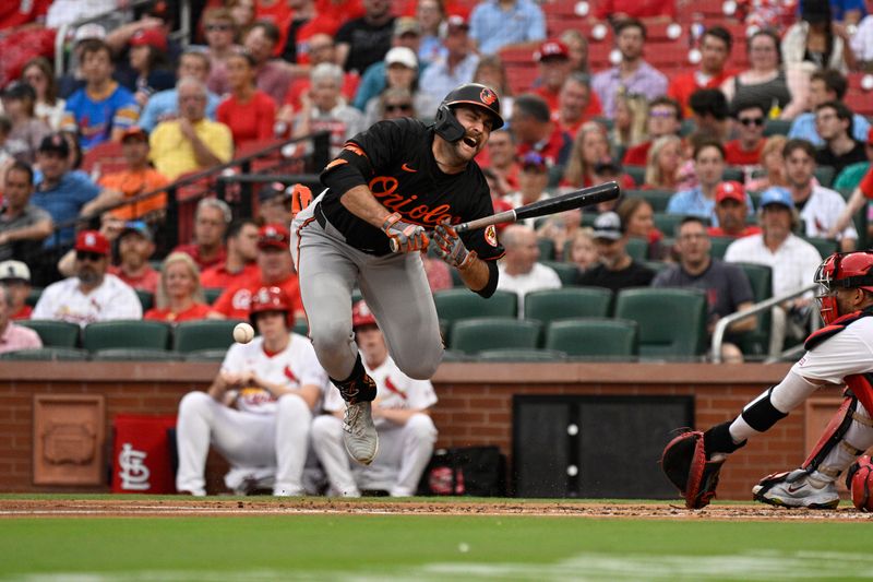 May 21, 2024; St. Louis, Missouri, USA; Baltimore Orioles’ Ryan Mountcastle (6) is hit by a pitch during the second inning of a baseball game against the St. Louis Cardinals at Busch Stadium. Mandatory Credit: Jeff Le-USA TODAY Sports