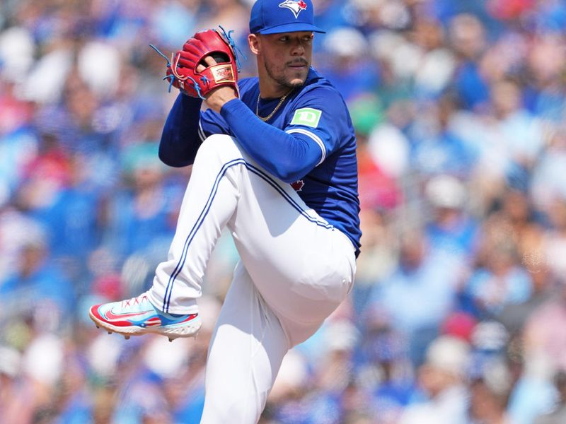 May 20, 2024; Toronto, Ontario, CAN; Toronto Blue Jays starting pitcher José Berrios (17) throws a pitch against the Chicago White Sox during the first inning at Rogers Centre. Mandatory Credit: Nick Turchiaro-USA TODAY Sports