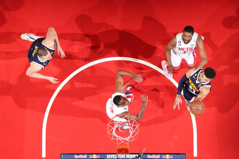 BROOKLYN, NY - MARCH 19: Jamal Murray #27 of the Denver Nuggets drives to the basket during the game against the Brooklyn Nets on March 19, 2023 at Barclays Center in Brooklyn, New York. NOTE TO USER: User expressly acknowledges and agrees that, by downloading and or using this Photograph, user is consenting to the terms and conditions of the Getty Images License Agreement. Mandatory Copyright Notice: Copyright 2023 NBAE (Photo by Nathaniel S. Butler/NBAE via Getty Images)