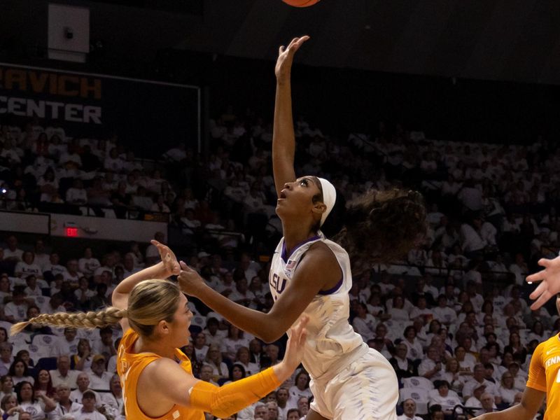 Jan 30, 2023; Baton Rouge, Louisiana, USA;  LSU Lady Tigers forward Angel Reese (10) drives to the basket against the Tennessee Lady Vols during the first half at Pete Maravich Assembly Center. Mandatory Credit: Stephen Lew-USA TODAY Sports