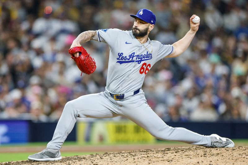 Jun 9, 2025; San Diego, California, USA; Los Angeles Dodgers relief pitcher Tanner Scott (66) throws a pitch during the tenth inning against the San Diego Padres at Petco Park. Mandatory Credit: David Frerker-Imagn Images