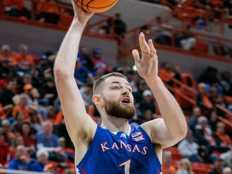 Jan 16, 2024; Stillwater, Oklahoma, USA; Kansas Jayhawks center Hunter Dickinson (1) puts up a shot during the second half against the Oklahoma State Cowboys at Gallagher-Iba Arena. Mandatory Credit: William Purnell-USA TODAY Sports