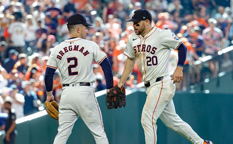 Jun 22, 2024; Houston, Texas, USA; Houston Astros right fielder Chas McCormick (20) celebrates with third baseman Alex Bregman (2) after the game against the Baltimore Orioles at Minute Maid Park. Mandatory Credit: Troy Taormina-USA TODAY Sports