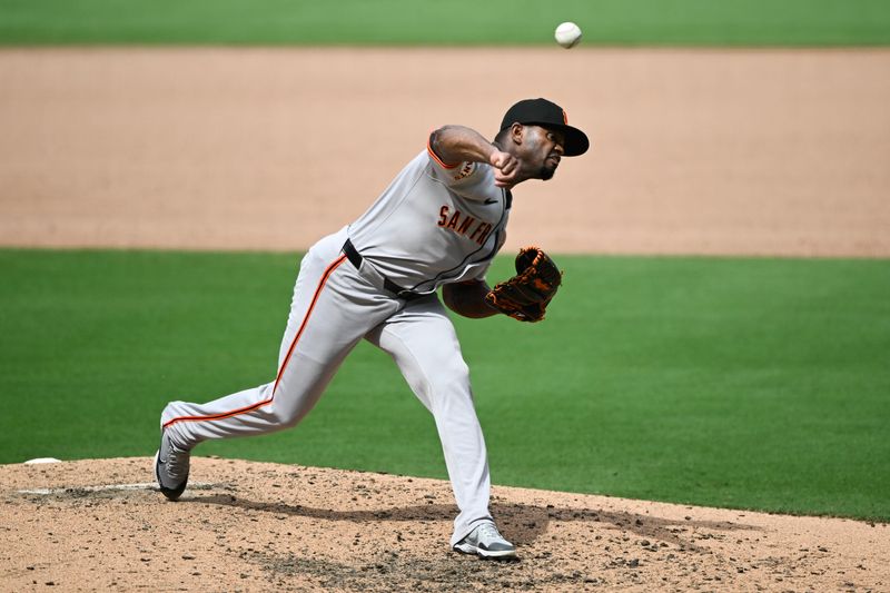 Aug 21, 2025; San Diego, California, USA; San Francisco Giants relief pitcher Joel Peguero (63) delivers during the sixth inning against the San Diego Padres at Petco Park. Mandatory Credit: Denis Poroy-Imagn Images