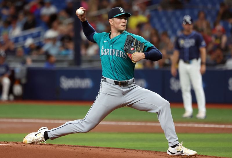 Jun 24, 2024; St. Petersburg, Florida, USA; Seattle Mariners pitcher Bryan Woo (22) throws a pitch against the Tampa Bay Rays during the first inning at Tropicana Field. Mandatory Credit: Kim Klement Neitzel-USA TODAY Sports