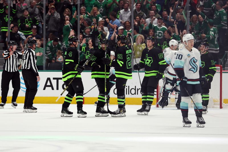 Apr 13, 2024; Dallas, Texas, USA; Dallas Stars players celebrate a goal against the Seattle Kraken in the first period at American Airlines Center. Mandatory Credit: Tim Heitman-USA TODAY Sports