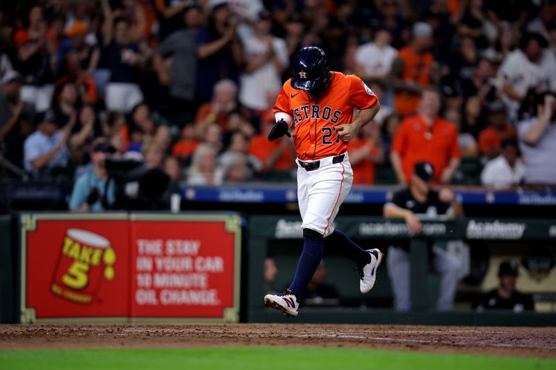 Aug 16, 2024; Houston, Texas, USA; Houston Astros second baseman Jose Altuve (27) crosses home plate to score a run against the Chicago White Sox during the third inning at Minute Maid Park. Mandatory Credit: Erik Williams-USA TODAY Sports