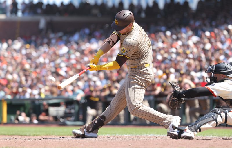 Jun 5, 2025; San Francisco, California, USA; San Diego Padres designated hitter Gavin Sheets (30) hits a single against the San Francisco Giants during the ninth inning at Oracle Park. Mandatory Credit: Kelley L Cox-Imagn Images