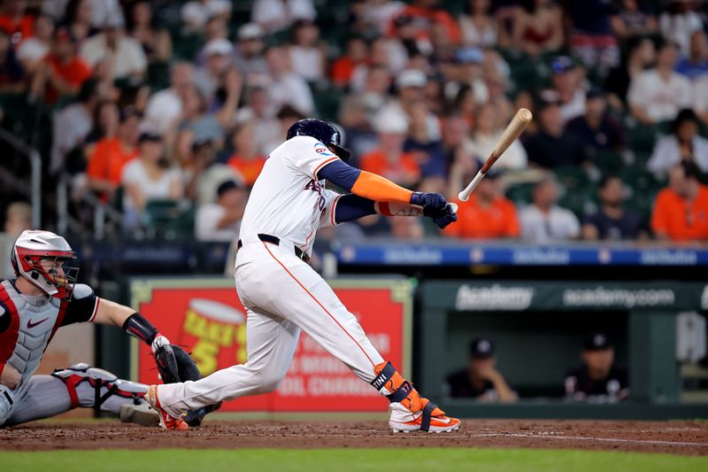 Jun 2, 2024; Houston, Texas, USA; Houston Astros catcher Victor Caratini (17) loses control of his bat while swinging at a pitch against the Minnesota Twins during the second inning during the second inning at Minute Maid Park. Mandatory Credit: Erik Williams-USA TODAY Sports