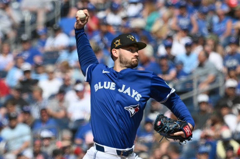 May 19, 2024; Toronto, Ontario, CAN;  Toronto Blue Jays relief pitcher Zach Pop (56) delivers a pitch against the Tampa Bay Rays in the ninth inning at Rogers Centre. Mandatory Credit: Dan Hamilton-USA TODAY Sports